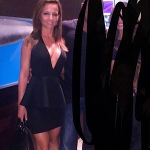 Black mid length deep cut dress